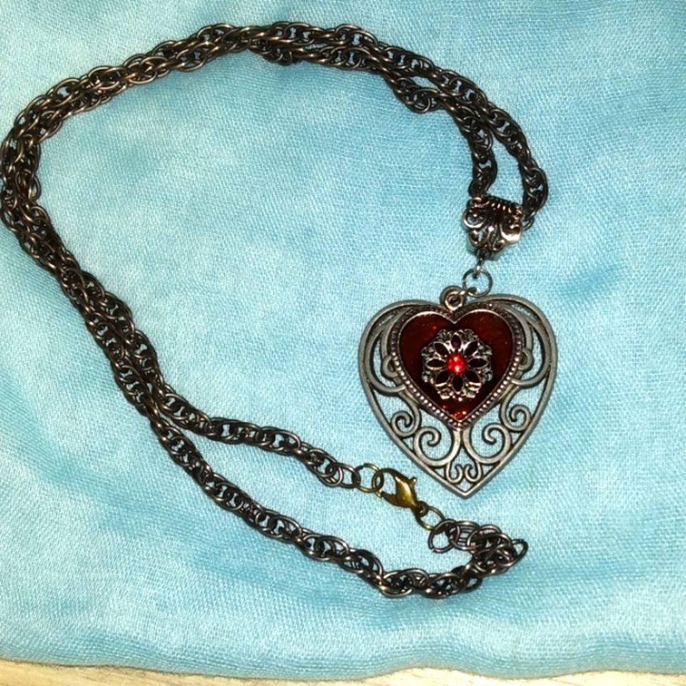 Hearts on blackened chain one scrolled one red enamel and rhinestone